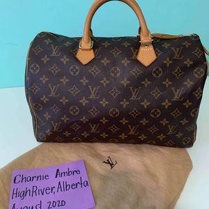 Speedy 30 Handbag in  brown monogram canvass